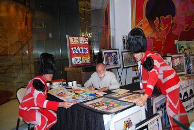 LOVE SHOW GUARDSMEN TAKE A TIME OUT TO ADMIRE RON CAMPBELL'S ART