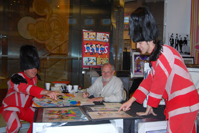 LOVE SHOW GUARDSMEN TAKE A TIME OUT TO ADMIRE RON CAMPBELL'S ART